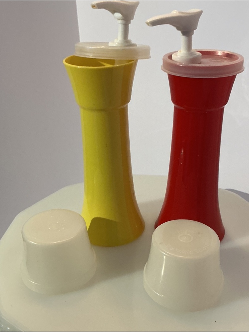 Tupperware Red and Yellow Condiment Pumps